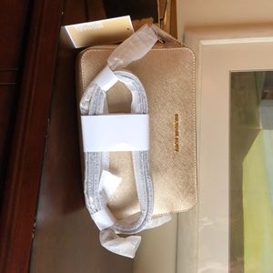 Gold Michael Kors Jet crossbody bag and wallet set